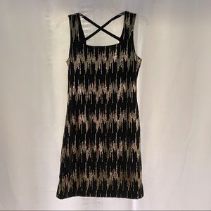 Black and gold sequin dress.